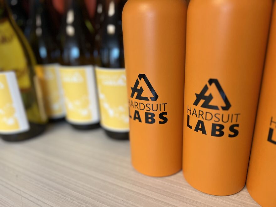 Bottles with Hardsuit labs written on them